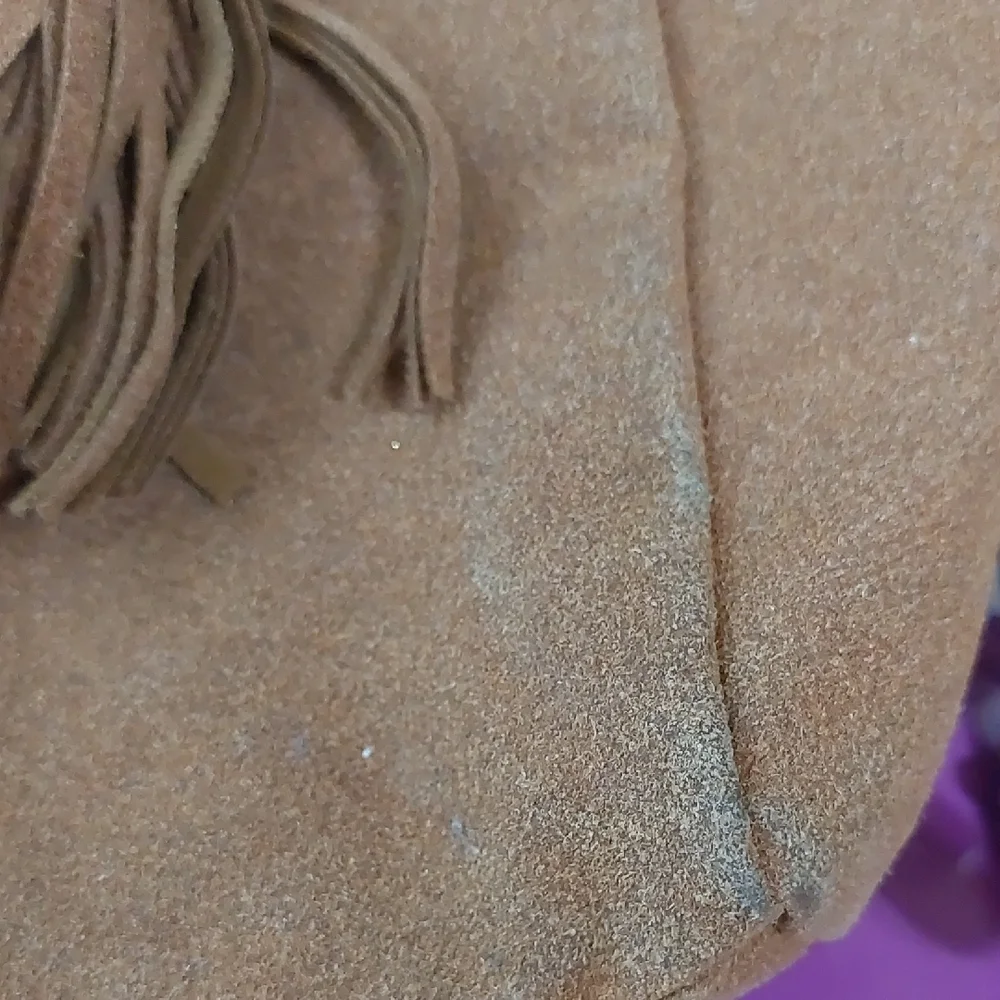 Elegant Tan Suede Backpack with Tassel Accents